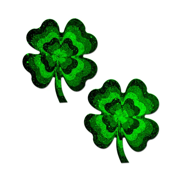 Pastease green glitter four-leaf clover nipple pasties matching pair against a dark background