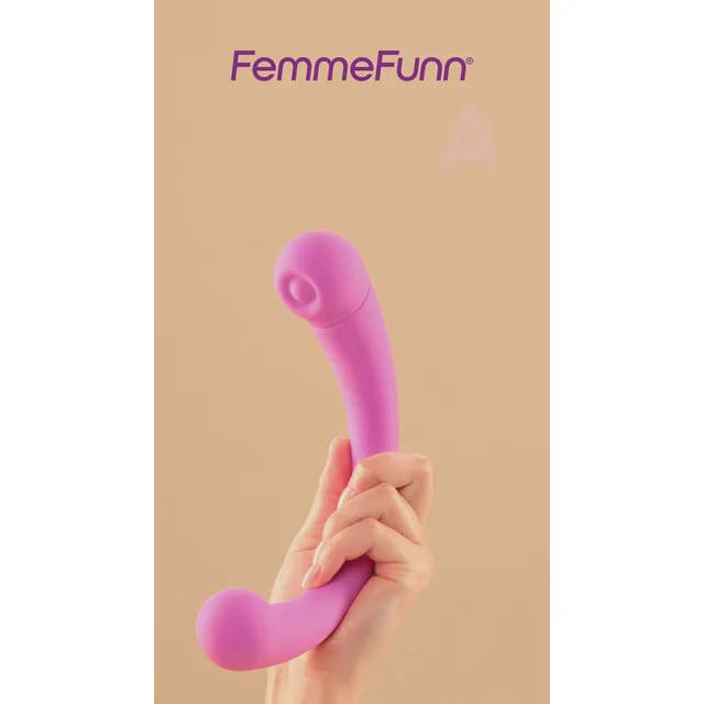 Hand holding the curved pink FemmeFunn Aluna vibrator
