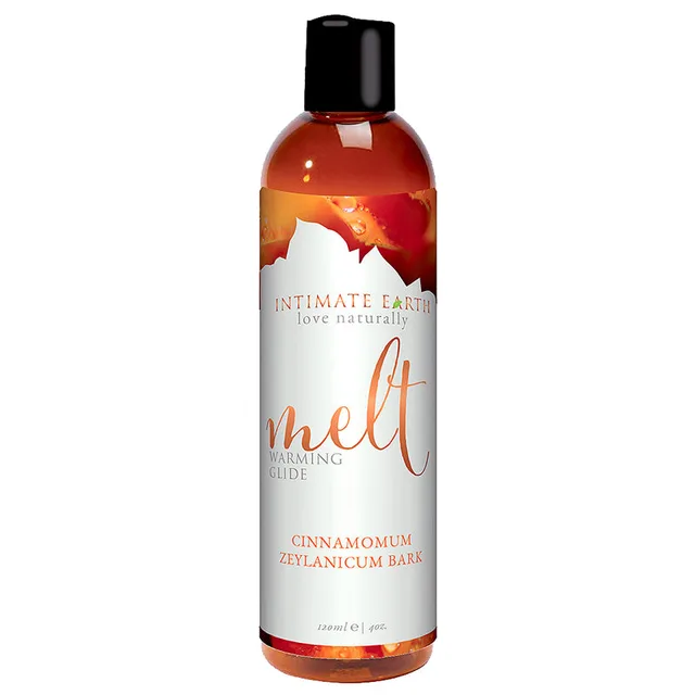 Intimate Earth Melt 4 oz Glide tall amber bottle with orange white cinnamon bark label
