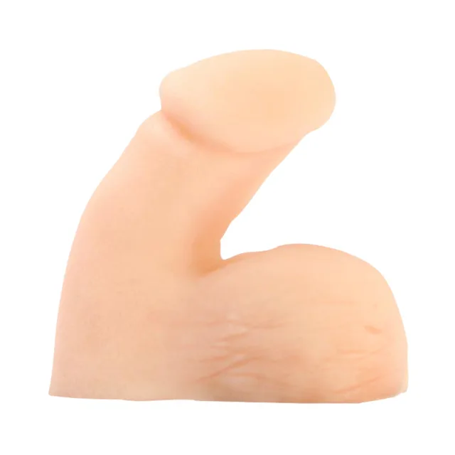 side profile of cream Tantus packer with curved sculpted shaft and broad textured base