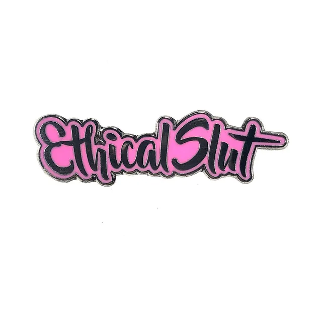 light pink Ethical Slut script enamel pin with black outline