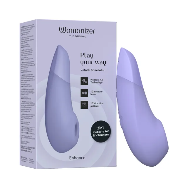 Lilac Womanizer Enhance curved stimulator beside pale-purple box