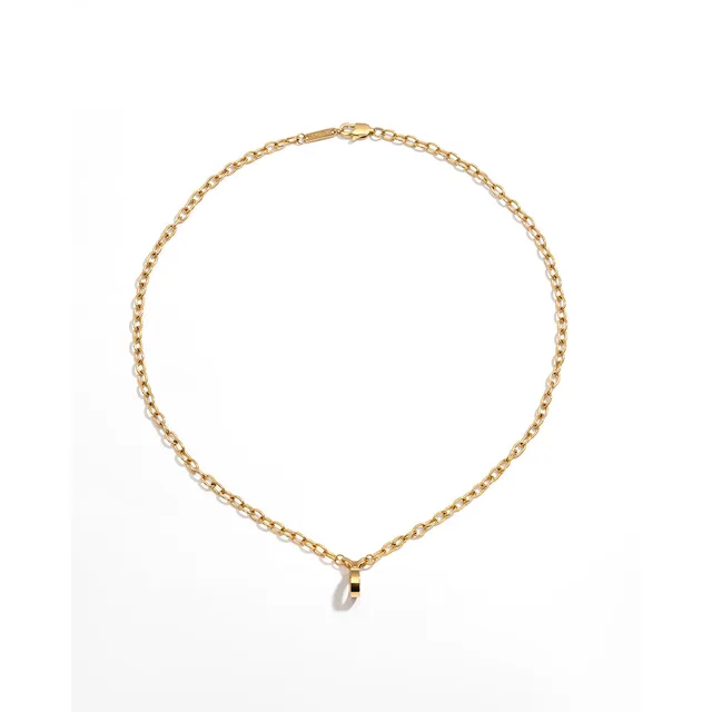 Crave Tease gold cylindrical pendant necklace vibrator rear of the necklace with small clasp visible