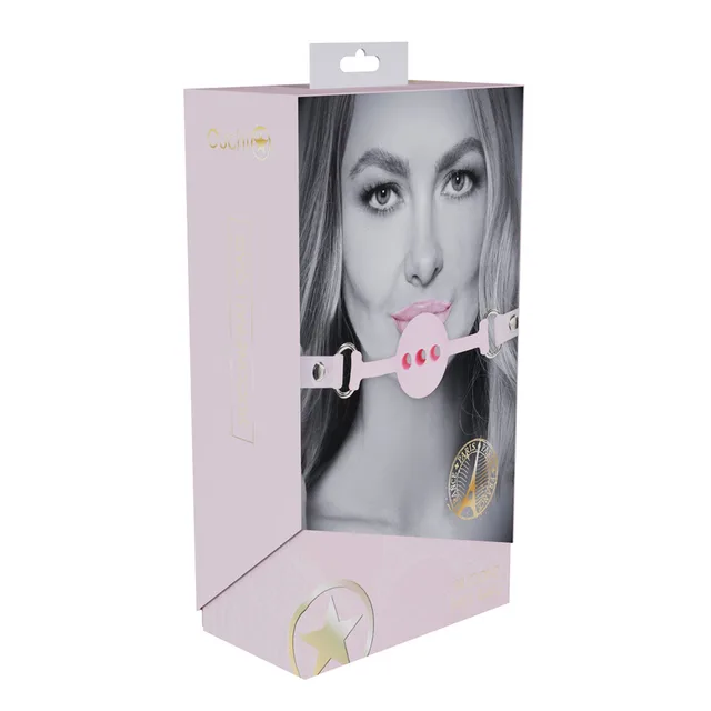 pink perforated silicone ball gag with bonded-leather strap on box