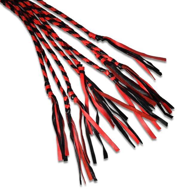 Close-up of twisted red and black Prowler RED flogger tails