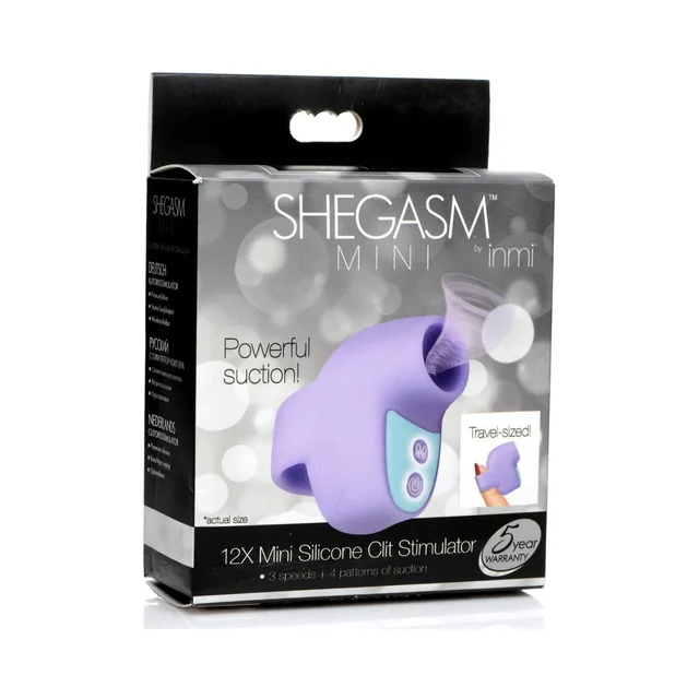 purple Shegasm Mini 12X finger-strap silicone clit stimulator pictured on box