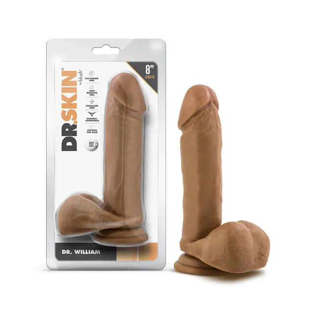 Blush Dr. Skin Dr. William tan 8-inch TPE dildo beside front retail package