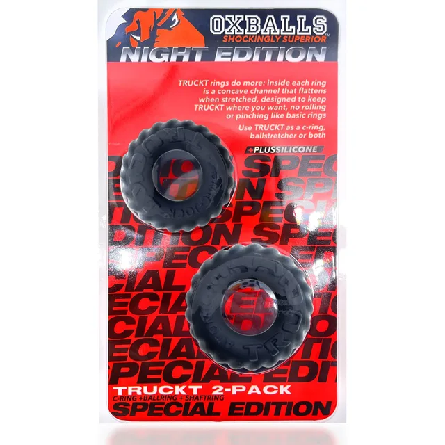 Two OxBalls Truckt Night rings displayed on red retail packaging