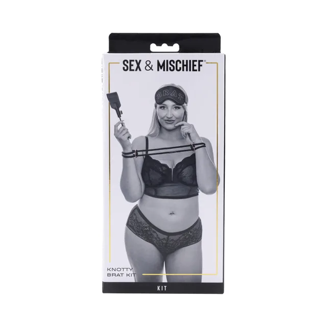 Sportsheets Knotty Brat Kit box with model holding black rope cuffs and mini crop
