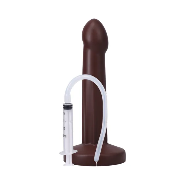 Espresso POP dildo beside connected graduated syringe