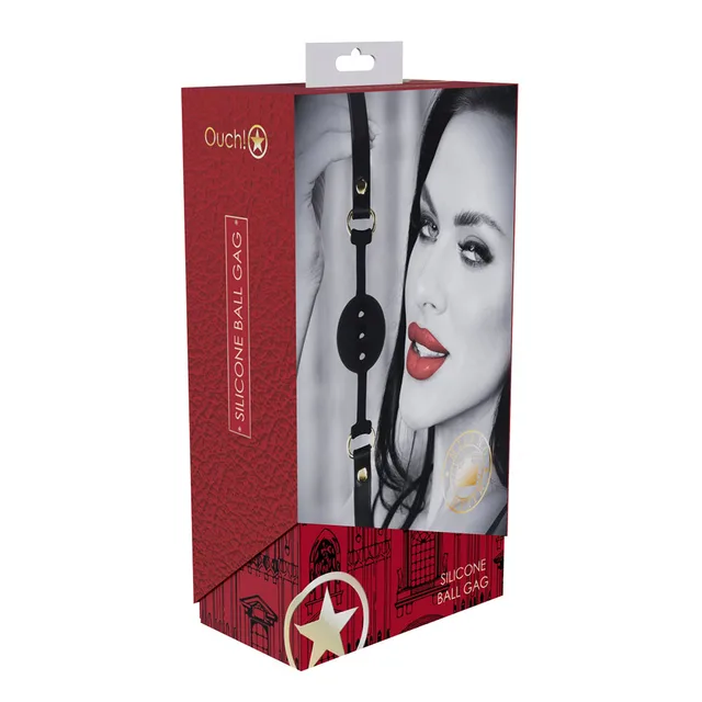 black perforated silicone ball gag with leather strap displayed on red box