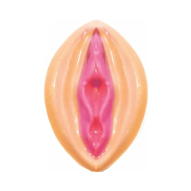 Hott Products Pussy Bites Strawberry Candy single beige and pink molded candy close-up