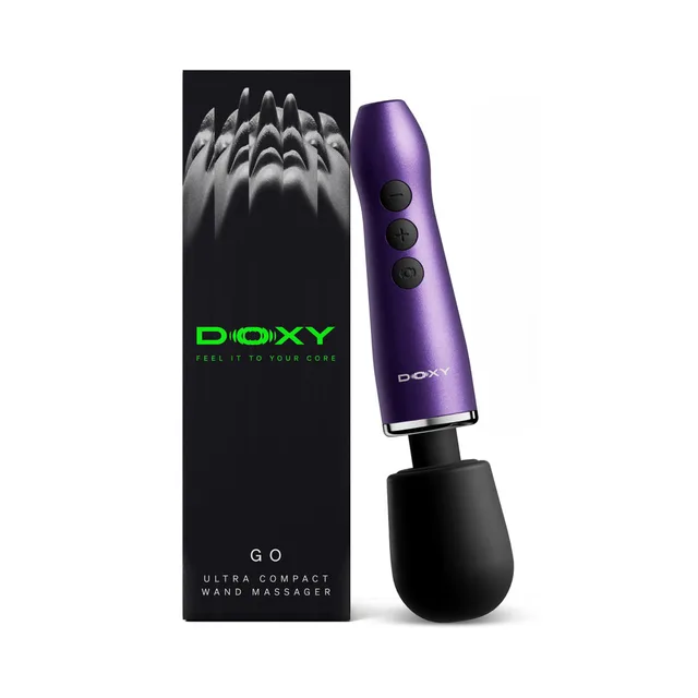 Doxy Go travel purple wand beside black retail box