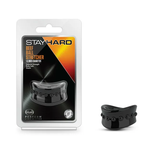 Black studded Beef Ball 1.5-inch stretcher beside package