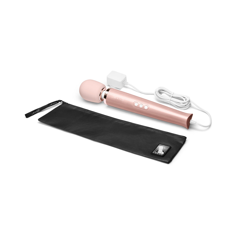 Le Wand Plug-In Vibrating Massager Rose Gold Le Wand rose gold plug-in massager wand with black storage pouch and power cord