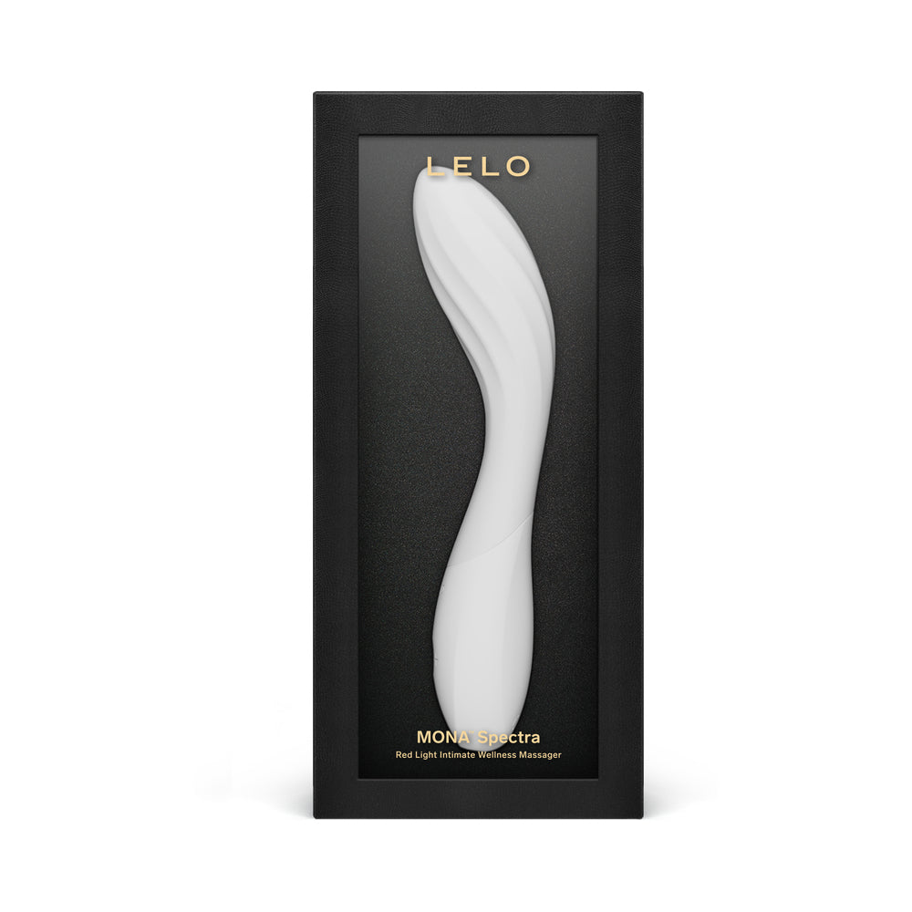 LELO Mona Spectra Massager Light Pink LELO Mona Spectra light pink curved LED massager inside the tall black retail box