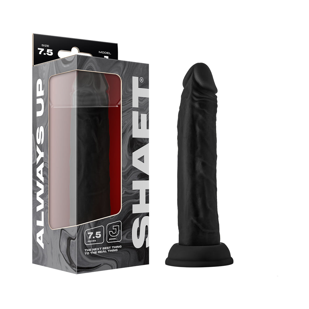 Shaft Model J 7.5 in. Liquid Silicone Dong Black Shaft Model J 7.5-inch black dong beside gray retail box