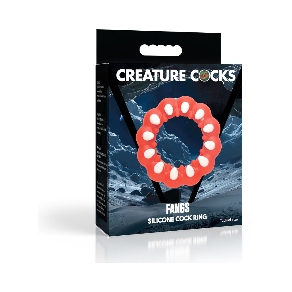 Creature Cocks Fangs Silicone Cock Ring Creature Cocks Fangs red ring with white outer teeth and round inner bumps beside black retail box