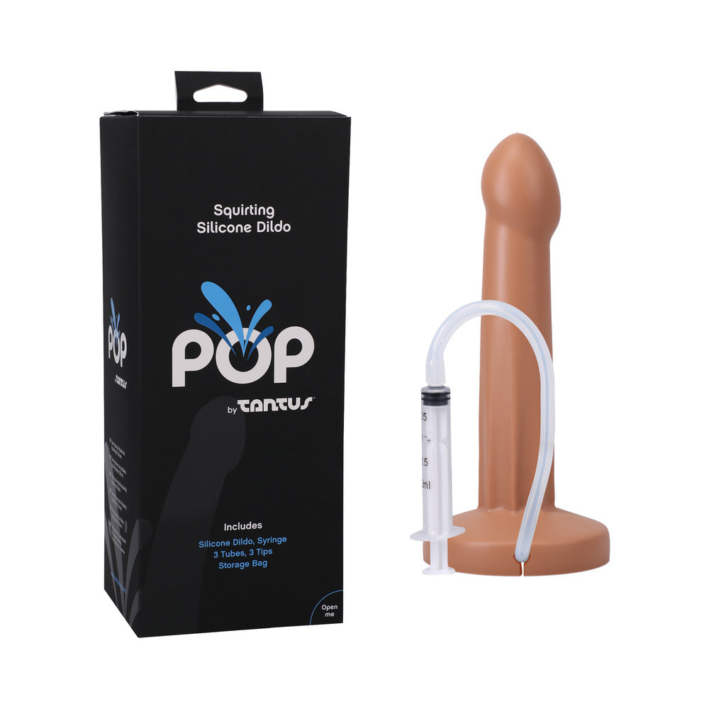 Tantus POP Squirting Dildo Honey Tantus POP honey dildo with syringe beside black retail box