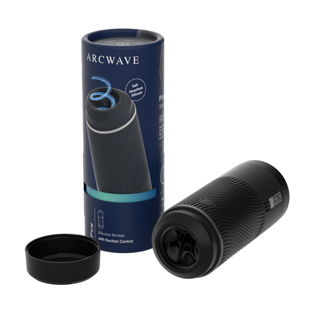 Arcwave Pow Silicone Stroker with Suction Control Black Arcwave Pow black cylindrical stroker beside blue package