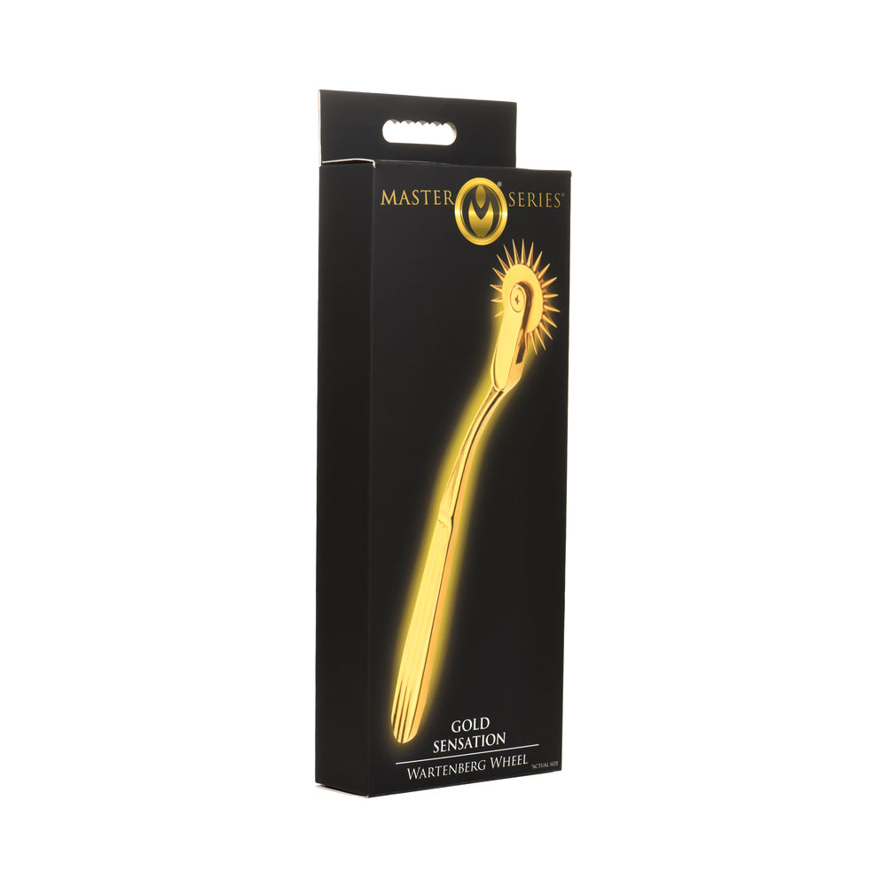 Master Series Gold Sensation Wartenberg Wheel Master Series Gold Sensation Wartenberg wheel with curved gold-tone handle beside matte-black retail box