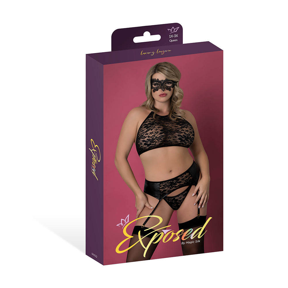 Magic Silk Sinful Halter Bra, Garter, Panty & Mask Set Black Queen Size Magic Silk Sinful black halter garter set Queen displayed in purple retail packaging