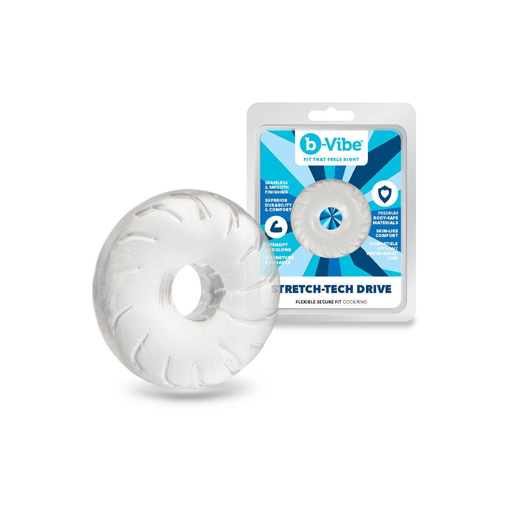b-Vibe Stretch-Tech Drive Ultra Stretchy C-Ring b-Vibe Stretch-Tech Drive clear C-ring beside its blue-and-white package