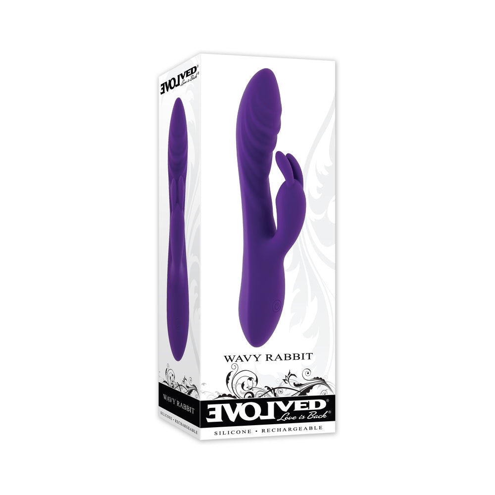 Evolved Wavy Rabbit Rechargeable Dual Stimulator Silicone Purple purple Evolved Wavy Rabbit dual stimulator standing inside its white retail box