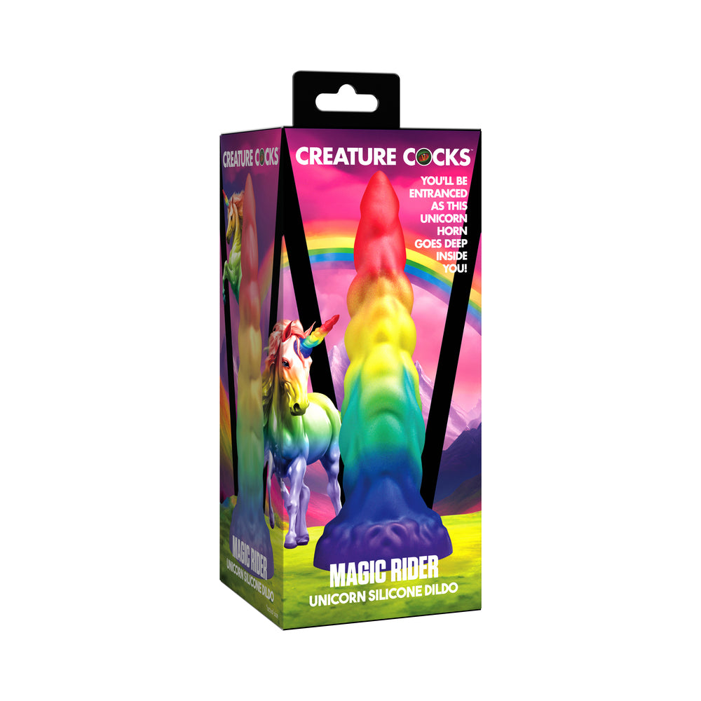 Creature Cocks Rainbow Horn Silicone Dildo Creature Cocks Magic Rider rainbow unicorn-horn dildo pictured in bright castle-themed retail box