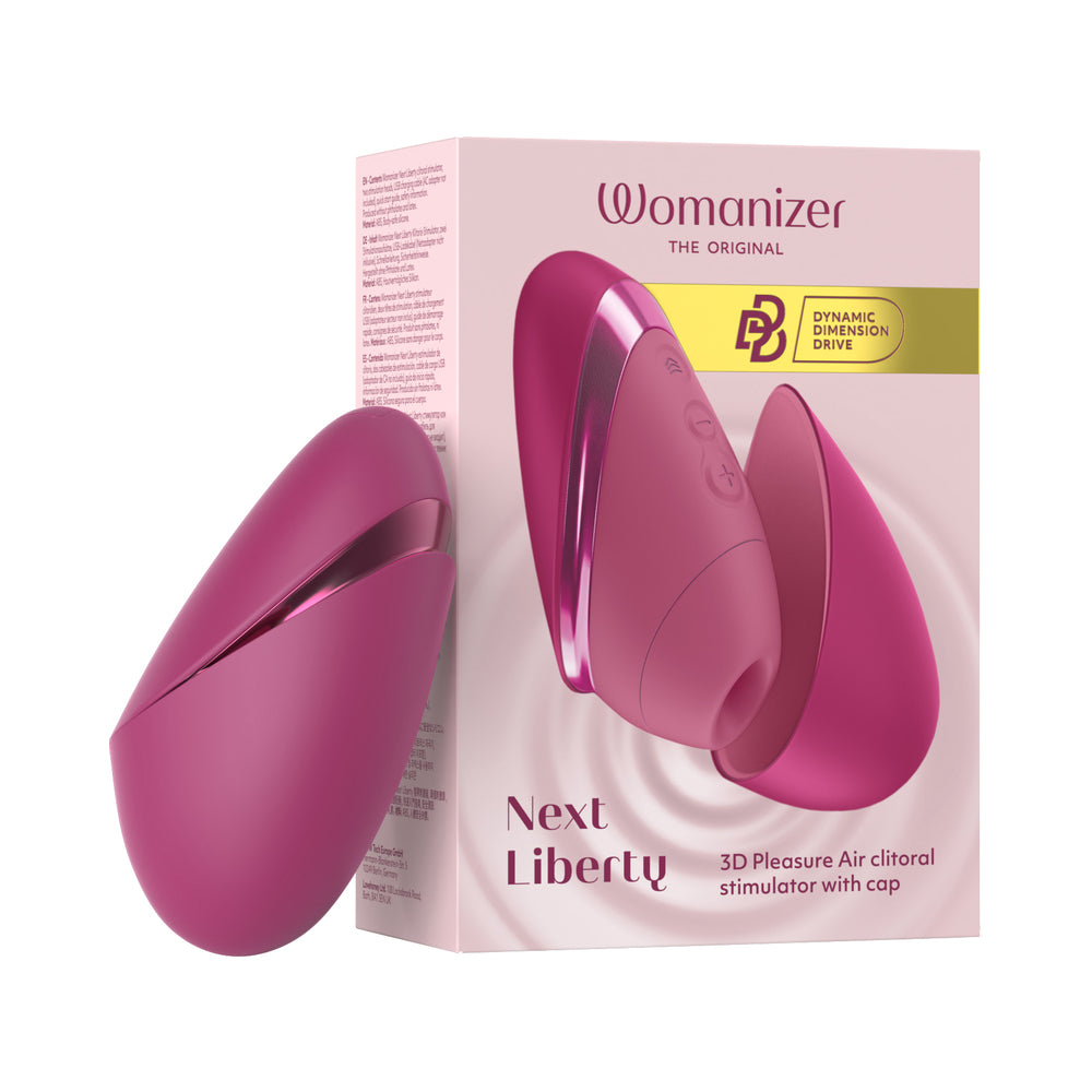 Womanizer Next Liberty Vibrant Pink Womanizer Next Liberty vibrant pink clitoral stimulator with protective cover beside the pink retail box