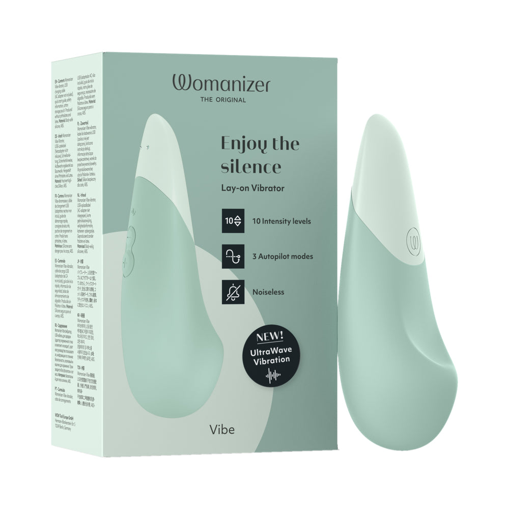 Womanizer Vibe Sage sage Womanizer Vibe vibrator standing beside pale green retail box