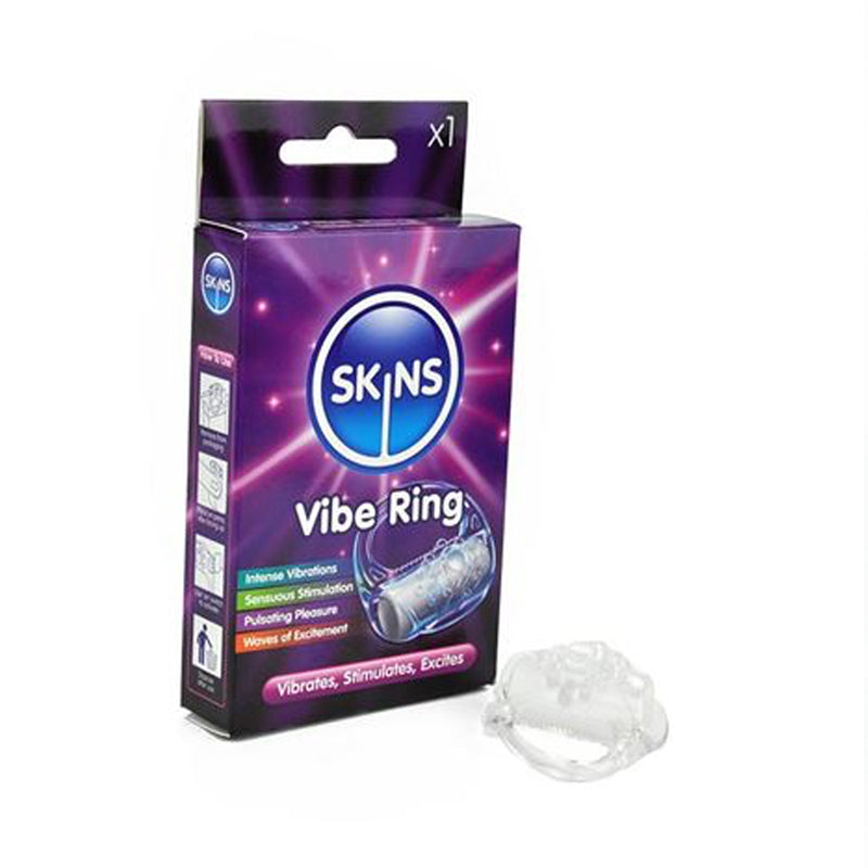 Skins Vibrating Ring Retail Pack Skins Clear TPE Vibrating Ring purple black retail pack beside clear ring and compact module
