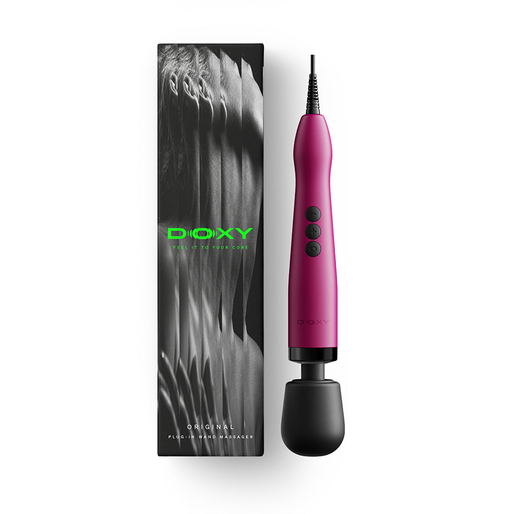 Doxy Original Massager Wand Pink Doxy Original plug-in pink wand beside black retail box