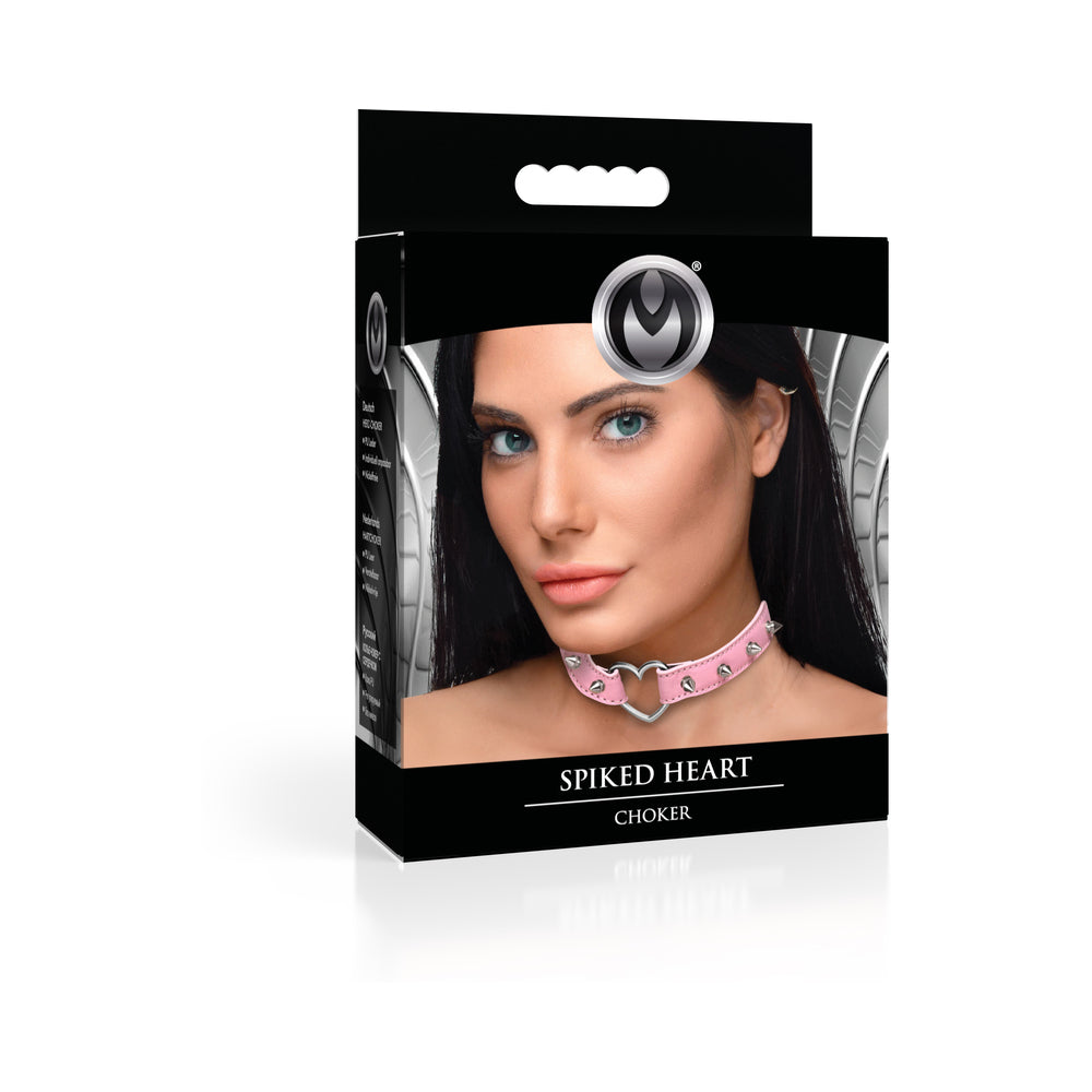 Master Series Spiked Heart Choker Pink XR Brands Master Series light-pink Spiked Heart choker with silver spike row and heart center on retail carton
