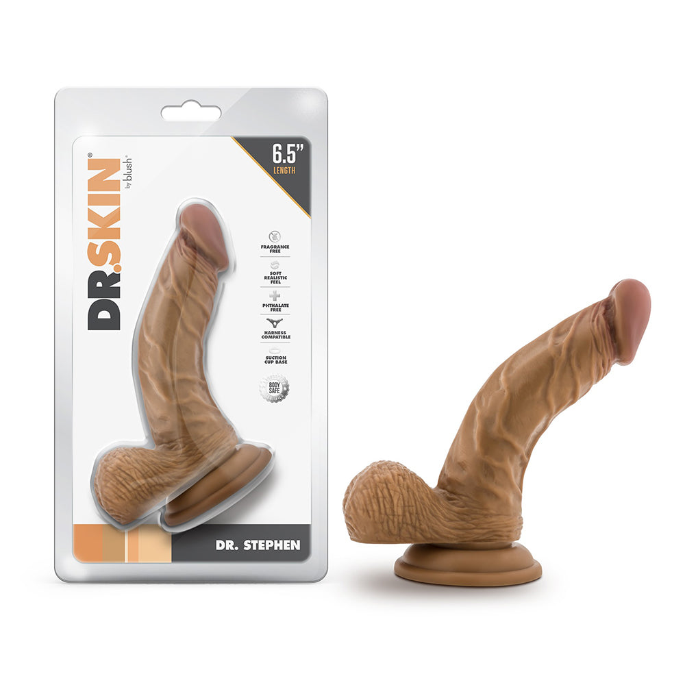 Dr. Skin Dr. Stephen 6.5 in. Dildo with Balls Tan Blush Dr. Skin Dr. Stephen tan 6.5-inch TPE dildo beside front retail package