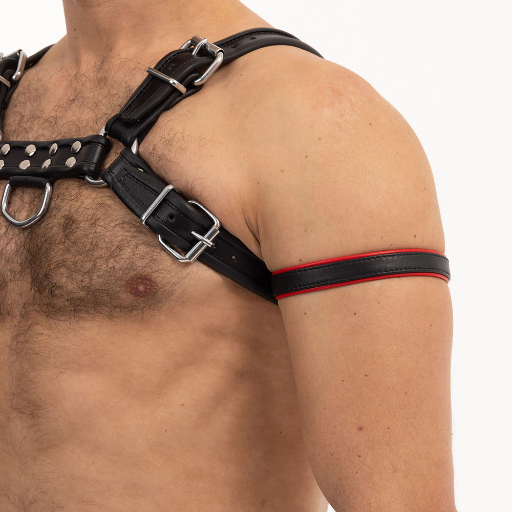 Prowler RED Bicep Band Black/Red Black Prowler RED leather bicep band with red edge stripe worn on upper arm