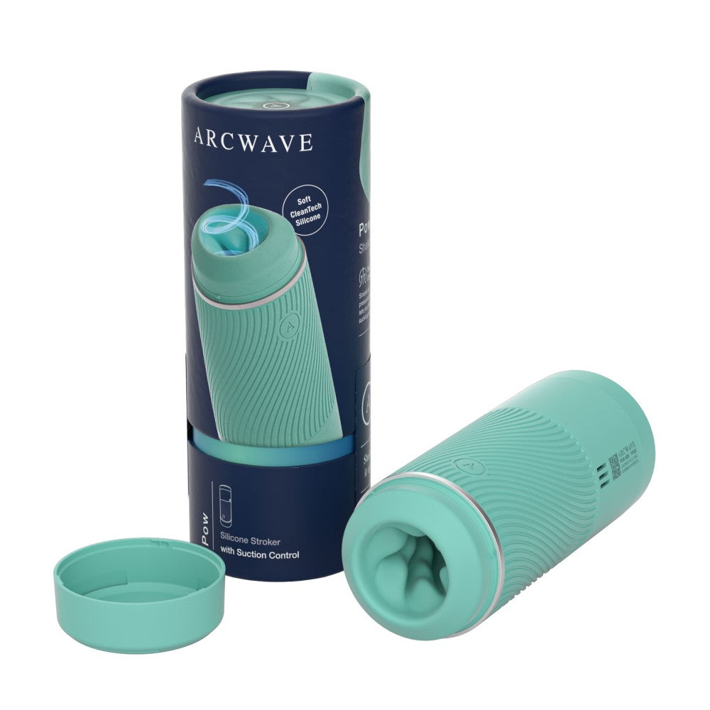 Arcwave Pow Silicone Stroker with Suction Control Mint Arcwave Pow mint cylindrical stroker beside retail tube