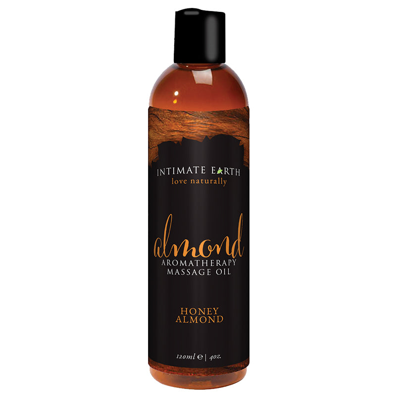 Intimate Earth Honey Almond Aromatherapy Massage Oil 4 oz. Intimate Earth Honey Almond Massage Oil amber 4 oz bottle with black honey almond label