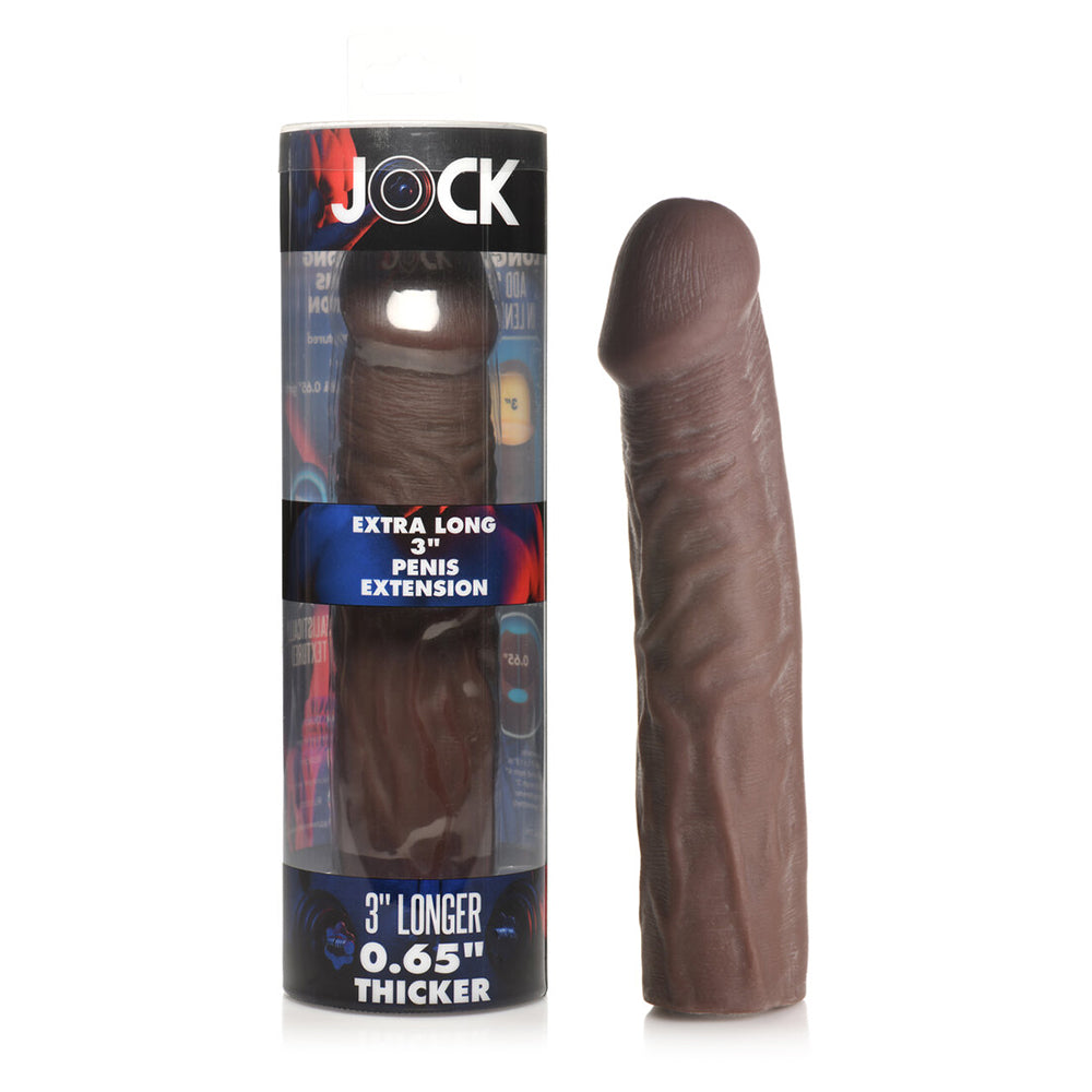Jock Extra Long Penis Extension Sleeve 3 in. Dark dark brown Jock extra-long 3-inch tip TPE sleeve beside retail box