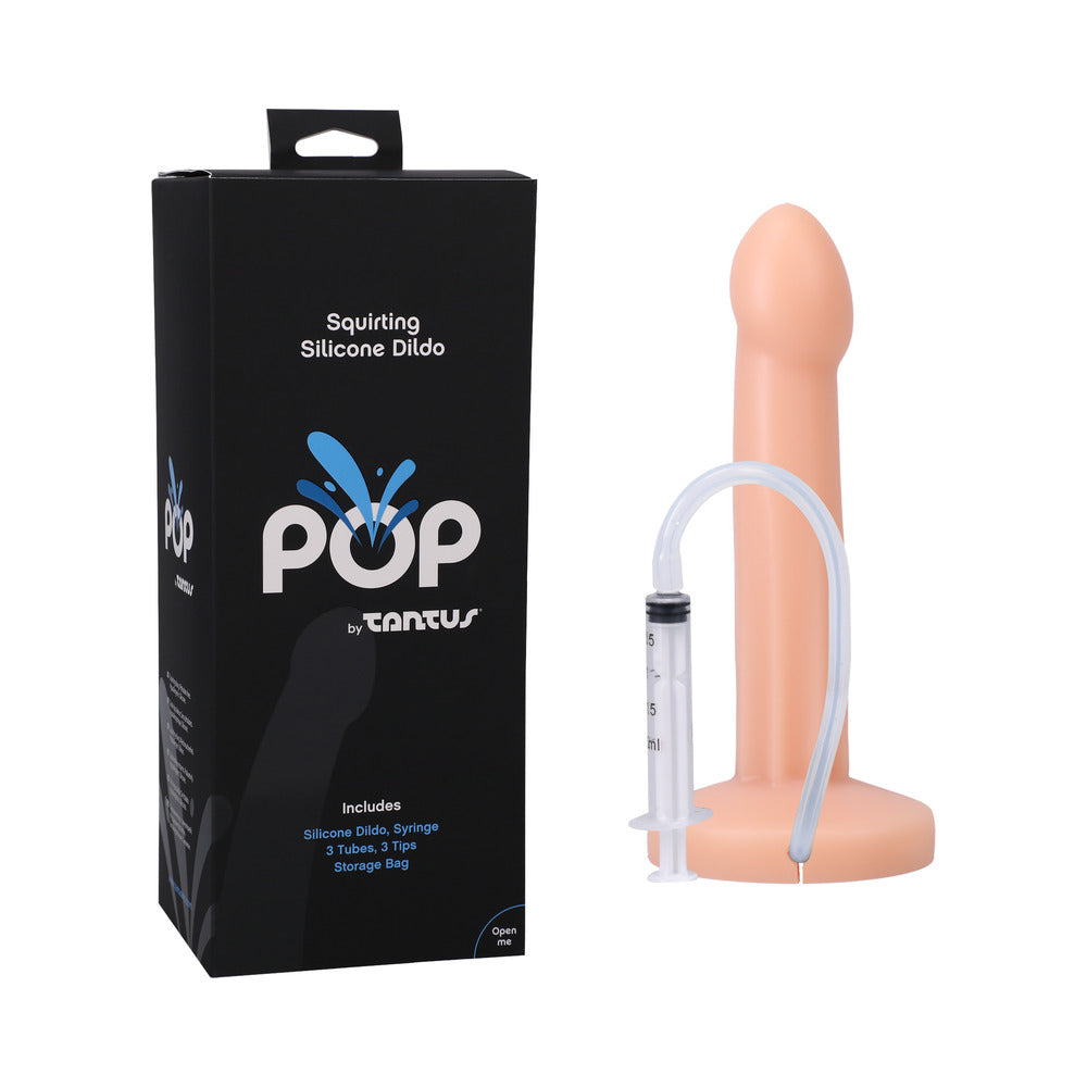 Tantus POP Squirting Dildo Cream Tantus POP cream dildo with syringe beside black retail box