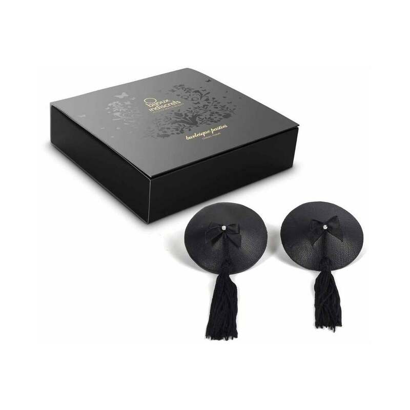 Bijoux Indiscrets Burlesque Pasties Classic Tassel pair of round black Burlesque pasties with center bows and long tassels beside black box
