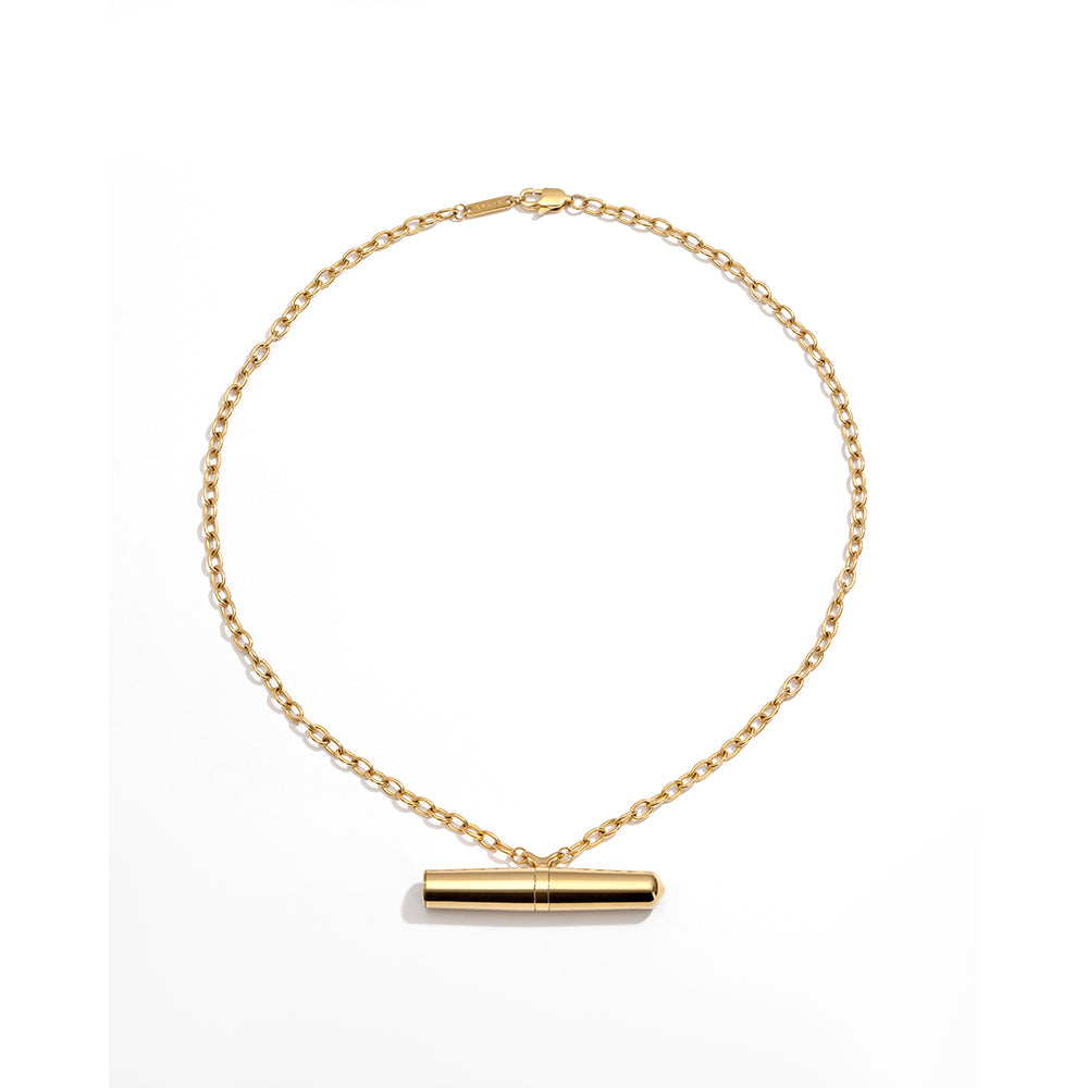 Crave Tease Necklace Gold Crave Tease gold cylindrical pendant necklace vibrator full necklace with horizontal pendant centered below the chain
