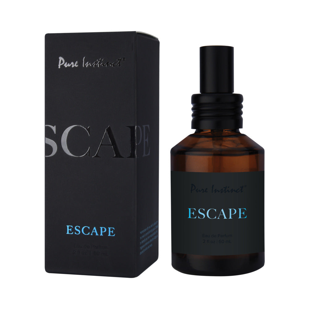 Pure Instinct Pheromone Eau De Parfum Escape 2 Floz | 60 Ml Pure Instinct Escape amber perfume spray bottle beside black box