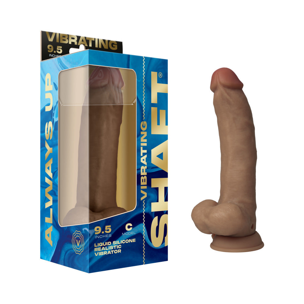 Shaft Vibrating Model C: 9.5 in. Dual Density Silicone Dildo Oak Shaft Model C oak silicone vibrator beside blue windowed retail box