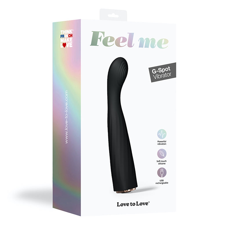 Love to Love Feel Me Rechargeable Silicone G-Spot Vibrator Noir Black curved Feel Me vibrator beside white Love to Love retail box