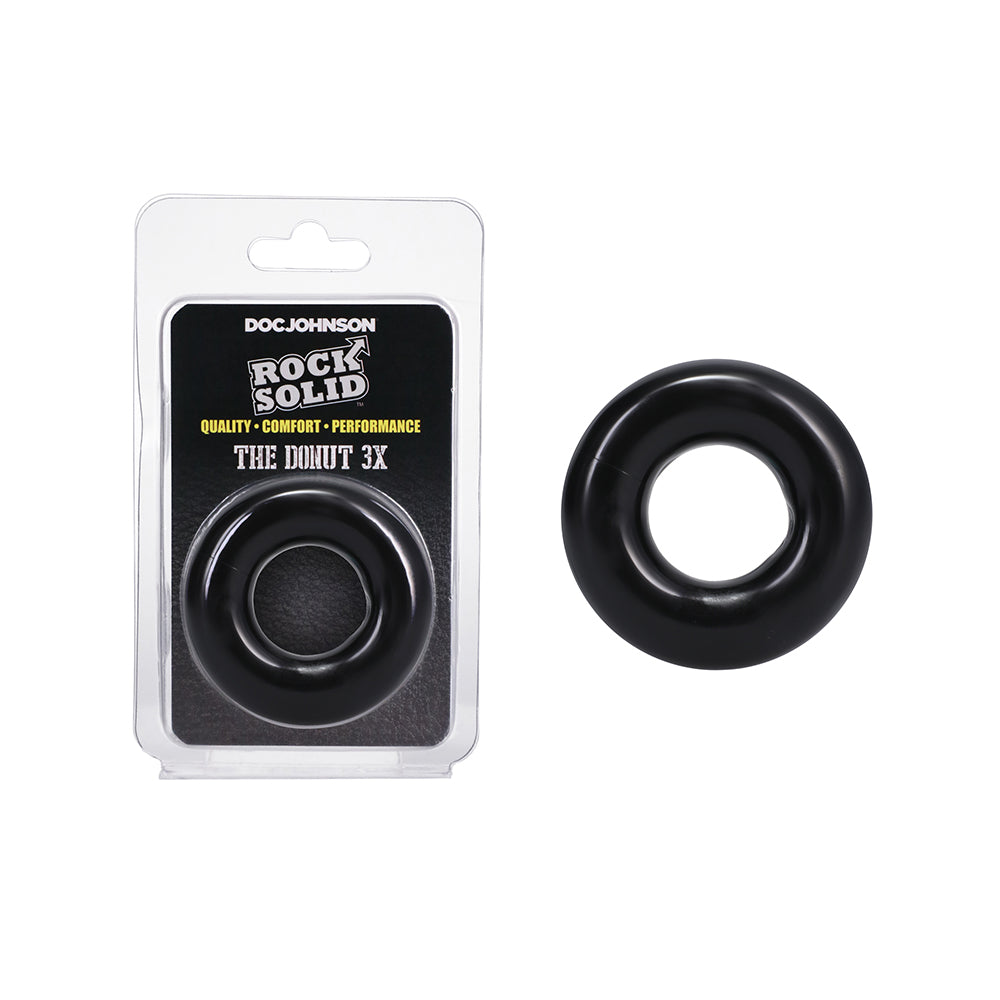 Rock Solid The Donut 3X Cock Ring Black Rock Solid The Donut black 2-inch TPE cock ring beside front retail package