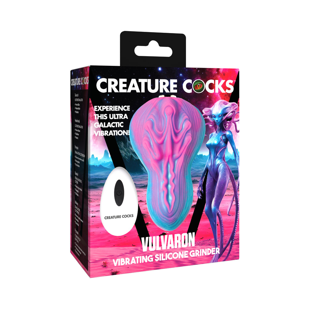 Creature Cocks Vulvaron Vibrating Silicone Grinder with Remote Control Creature Cocks Vulvaron pink teal and purple folded grinder pictured in bright sci-fi retail box