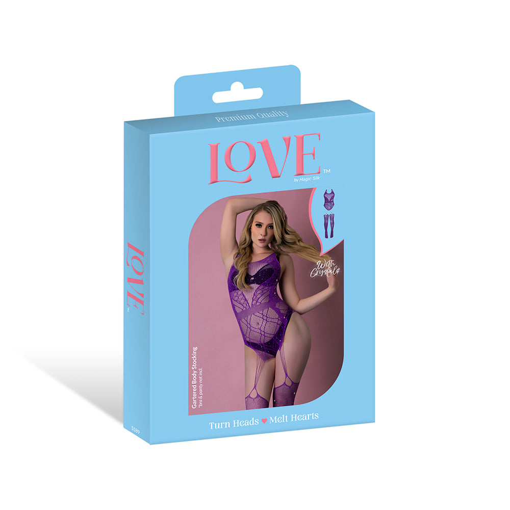 Magic Silk Seamless Gartered Bodystocking Violet O/S Magic Silk seamless purple gartered bodystocking displayed in blue retail packaging