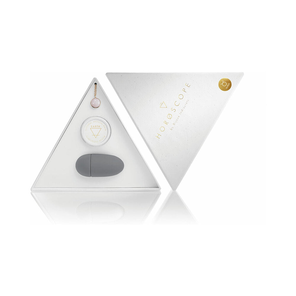 Bijoux Indiscrets Horoscope Kit Taurus open white triangular Taurus Horoscope kit with pale stone necklace balm and gray finger vibrator