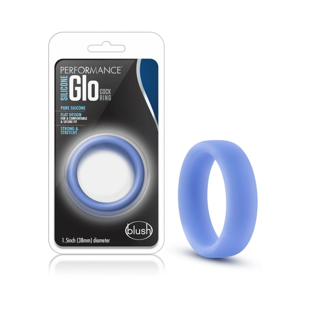 Performance Silicone Glo Cock Ring Blue Glow Blush Performance Glo pale-blue silicone ring beside matching Performance Glo retail package